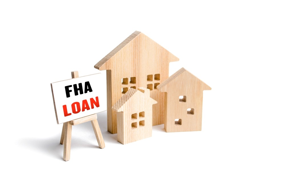 Houses,And,Easel,With,Fha,Loan.,Mortgage,Insured,By,Federal